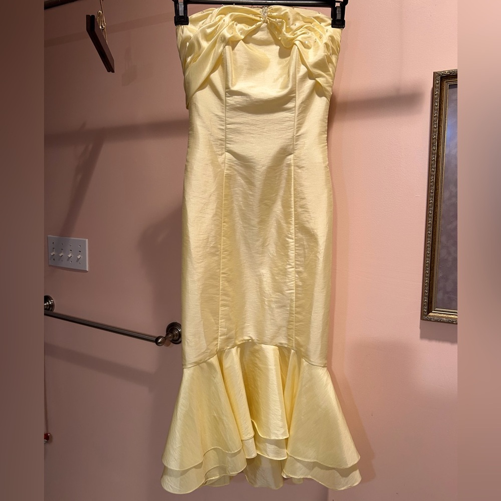 Bonny bridal dress. mermaid bottom with pearls on the front. straps/strapless